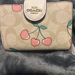 Coach Valentines Cherry Collection compact Wallet. Brand new with tags.